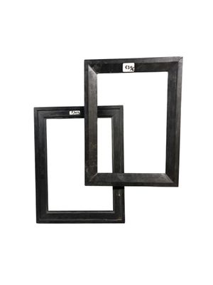 two black picture frames on a white background with a white background