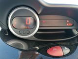 a digital clock on the dashboard of a motorcycle