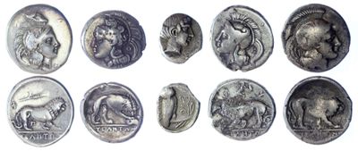 six different types of ancient coins are shown on a white surface