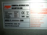 an image of a label on the side of a machine that says commercial microwave oven