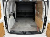 a white van with wood paneling in the back of it
