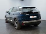 a blue car that is parked in a garage