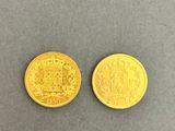deux pièces d'or, dont l'une porte un blason et l'autre représente un