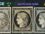 four different stamps of women in headdres on a black background
