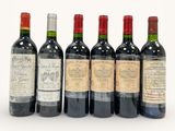 six bottles of wine are lined up in a row