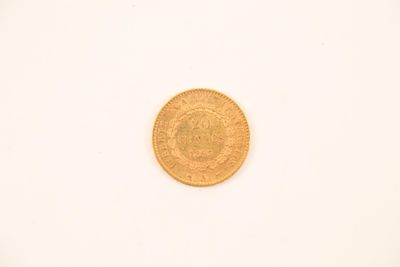 an image of a gold coin on a white surface