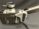 an old camera that is sitting on a table