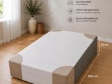 la taille d'un matelas dans une chambre avec un parquet