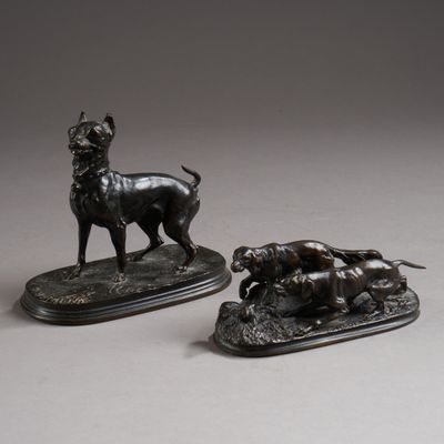 pair of bronze figurines of a dog and a cat