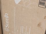 a cardboard box with a picture of a cat on it