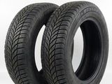 a pair of tires on a white background with the words vendu par lot de 2