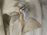 a piece of fabric that has been torn off of a bed