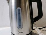 an image of a stainless steel kettle with a price tag