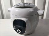 a white tea pot that is sitting on a table