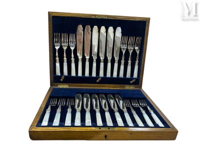 a wooden case with silverware inside of it