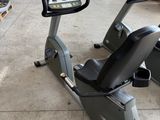 an image of a stationary exercise bike in a garage