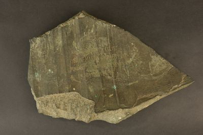a rock that has a large piece of rock on it