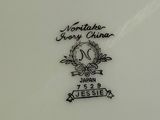 a close up of a plate with a design on it