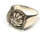 an image of a close up of a ring on a white surface
