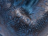 a close up of a statue of a bird on a pedestal