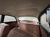 an image of a car with leather seats in the back of it