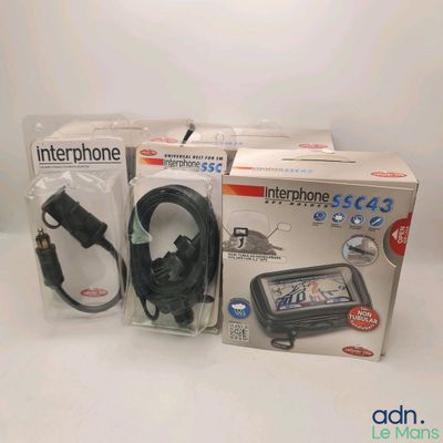 three electronic gadgets in the package on the table