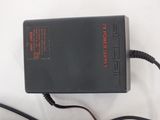 an image of a power supply that is sitting on a white surface