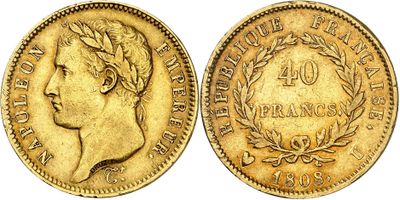 an image of a gold coin with a woman ' s head on it