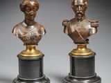 une paire de bustes en bronze représentant un homme et une femme