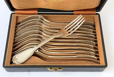 silverware in a wooden box with a handle and fork