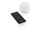 an image of a remote control and a charger