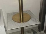 a small table with a lamp on top of it