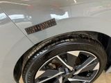 a close up of a car tire with a sticker on it