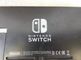 a close up of the nintendo switch logo on the back of the box