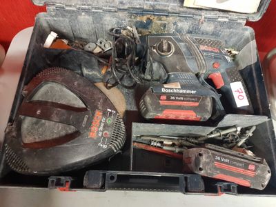 a tool box with tools in it sitting on a table