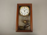 a clock that is hanging on the wall in the room