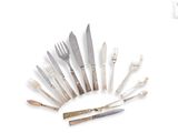 many different types of knives and forks arranged in a circle