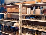 a room with a lot of items on the shelves