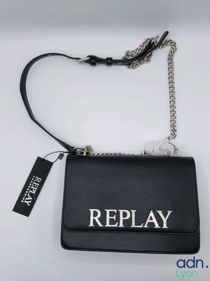 the black purse has a chain that says replay on it