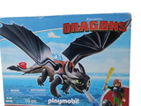 a box of playmobil with a picture of a dragon on it