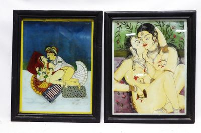 two framed paintings of a woman sitting on a couch and a man sitting on a couch