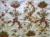 une image représentant un lit orné d'un motif floral