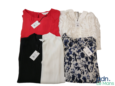 three women ' s blouses with a price tag on a white background