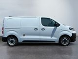 a picture of a white van parked in a parking lot