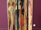 a room divider that has a picture of a woman on it