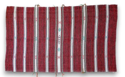 a close up of a red and white striped rug on a white background