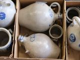 a box full of vases that are sitting on a table