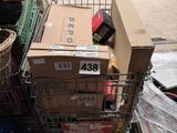 a cart full of boxes and other items sitting on the ground