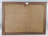 an old picture of a wooden frame with a label on it