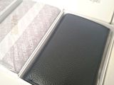 a box with a wallet inside of it on a table